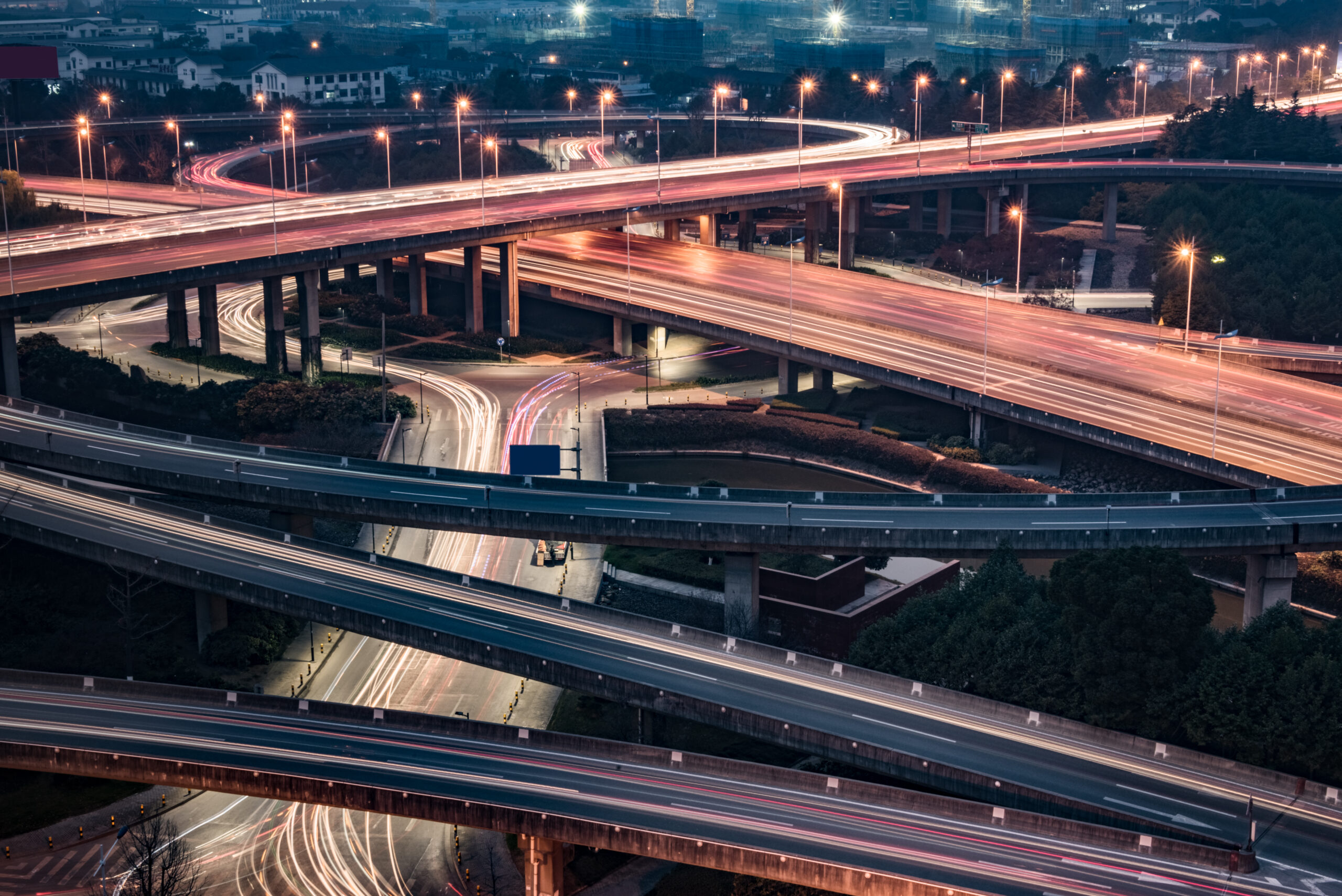 A visual representation of KKR and OTPP’s partnership to invest in India’s road infrastructure, showing digital illustrations of roads, highways, and toll infrastructure as part of the $700 million deal.